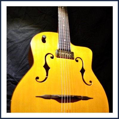 Luthier Guitare à Onde de Bois